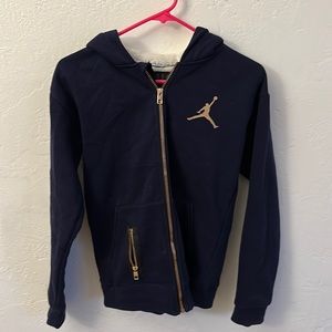 Navy blue Jordan jacket.